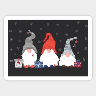 Three Christmas Gnomes with Snowflakes and Presents on Dark Grey Background Sticker